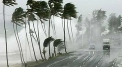 Hurricane Ernesto turns into a tropical storm off Bermuda