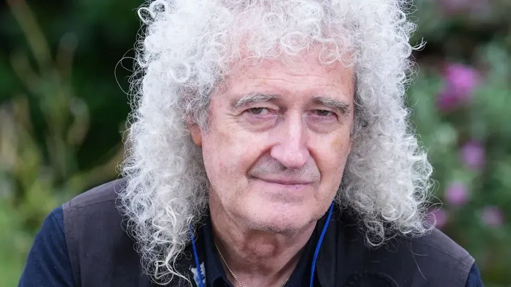 Queen guitarist Brian May suffered a minor stroke