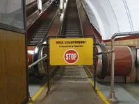 An escalator is being repaired in the passage between metro stations in the center of Kyiv