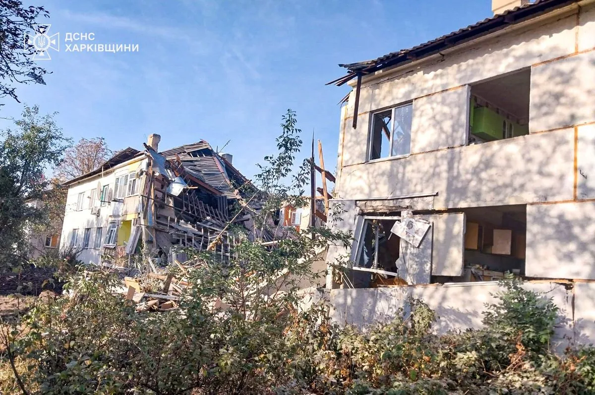 An 86-year-old woman rescued from the rubble of a house destroyed by Russian shelling in Kharkiv region