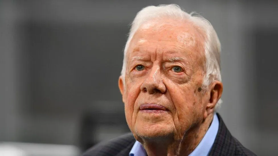 Centenarian former US President Carter casts early vote for Harris