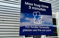 No hugging for more than 3 minutes: a restrictive sign was installed at the New Zealand airport