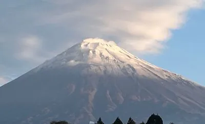 Japan's iconic Mount Fuji, famous for its blanket of snow, is finally covered in white