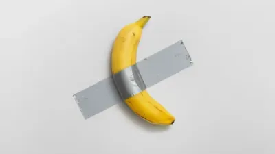 A banana taped together with duct tape sold at auction for a record $6.2 million