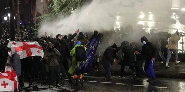 In Tbilisi, security forces use smoke bombs and water cannons to disperse protesters