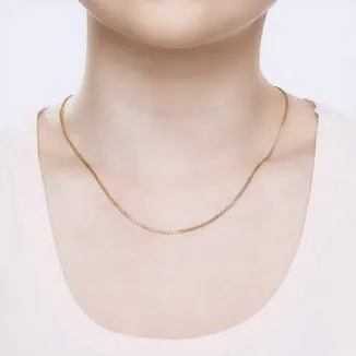 Gold chain-a jewelry addition to a feminine look