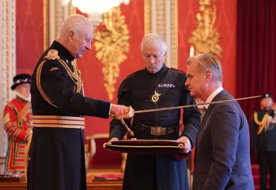 Director Christopher Nolan receives knighthood from King Charles