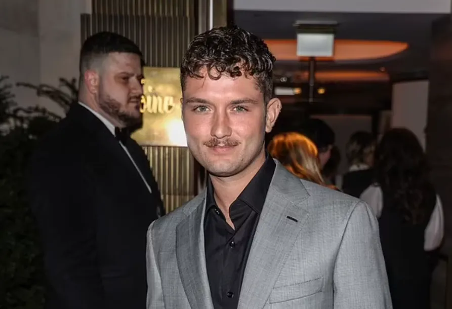 Juda Low's son impressed with his father at Vanity Fair's party in London