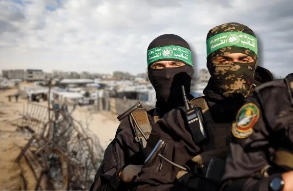 Hamas suspends hostage release, blames Israel