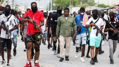 Armed gangs attack Haiti's capital again, killing dozens