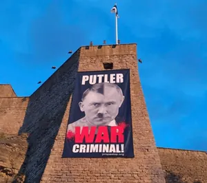 In Narva, on the border with Russia, a poster with Putin depicted as Hitler was displayed.