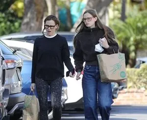 Violet Affleck towered over her mother, enjoying socializing during the holidays